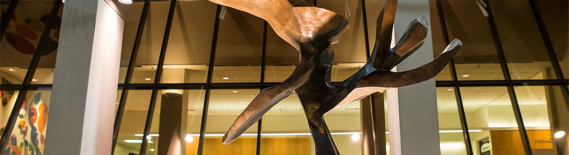 a sculpture in front of the Kornberg School of Dentistry building in North Philadelphia.