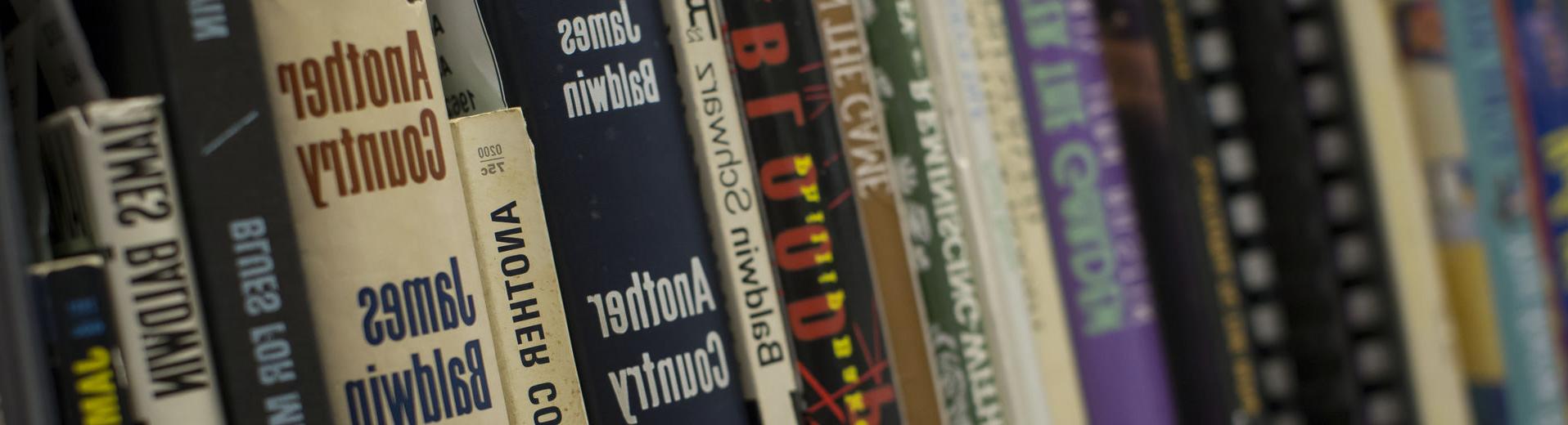 Books on a shelf in a library at Temple University