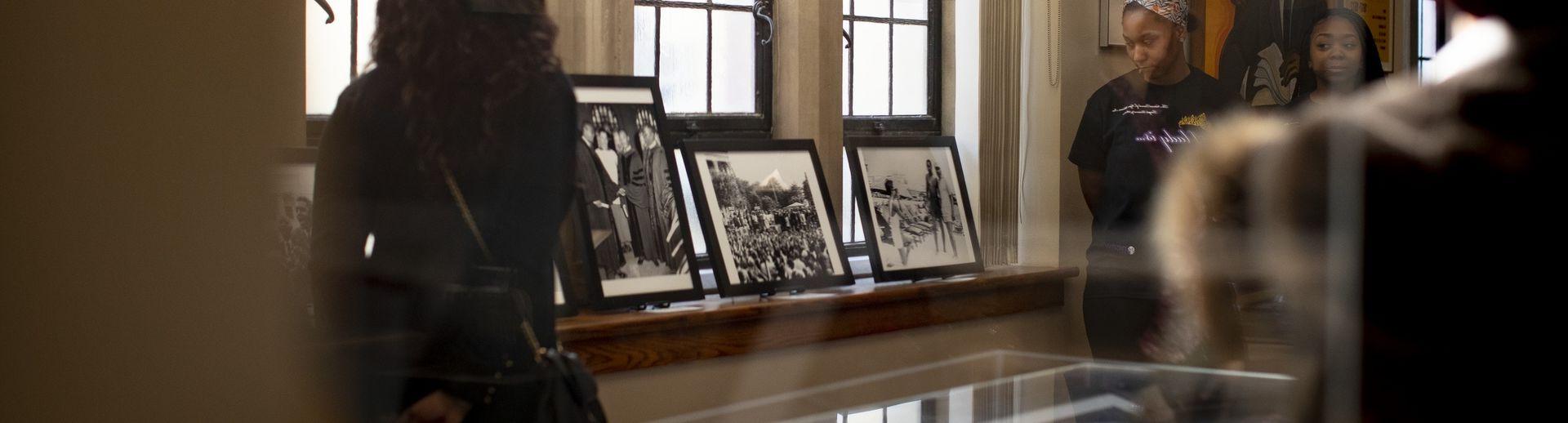 Students view a collection at the Charles Blockson Collection on campus.