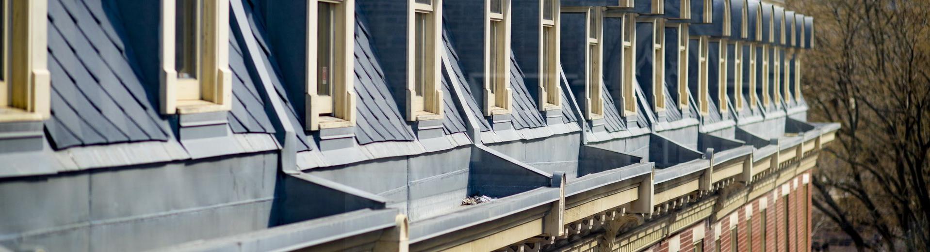 Dormers on a colonial-style building on Temple University Main Campus.